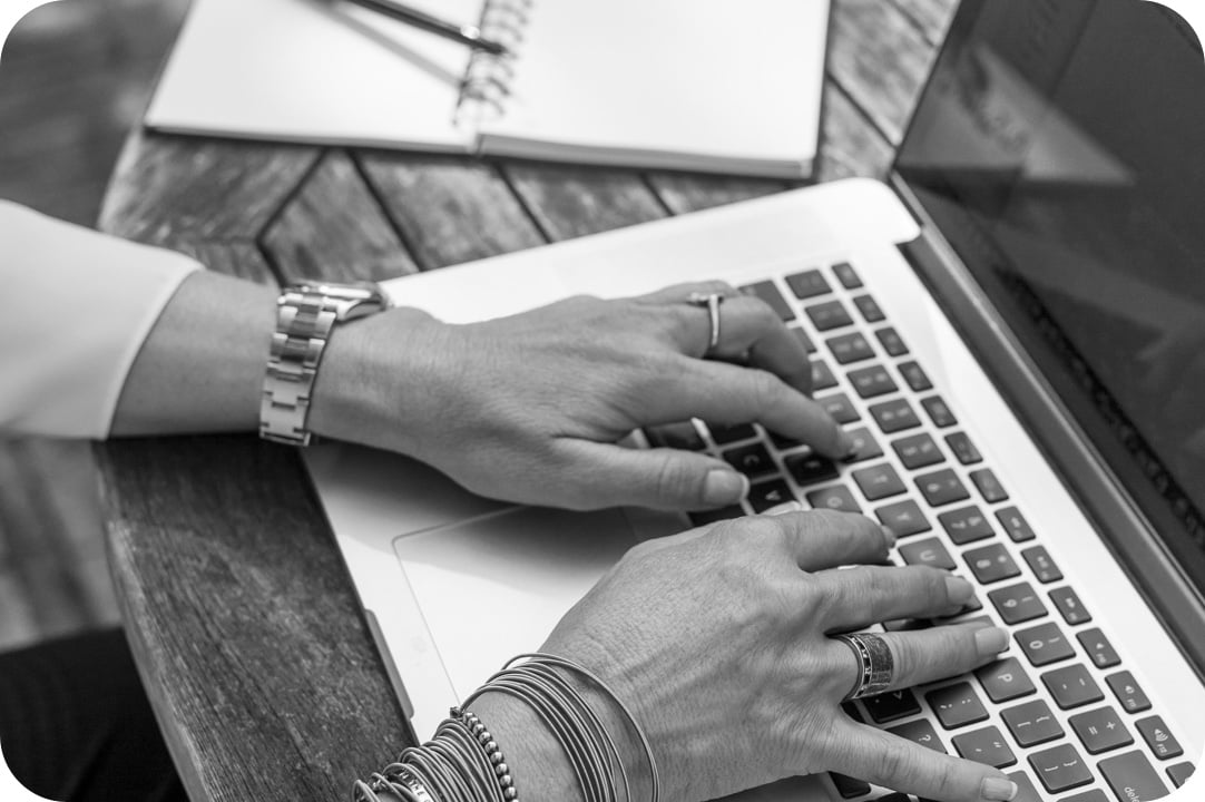 Person typing on computer