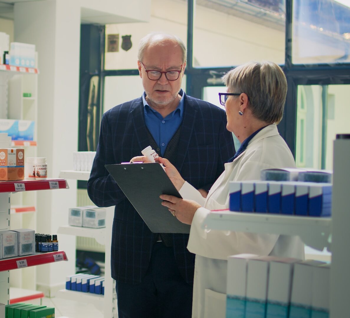 pharmacist helping patient